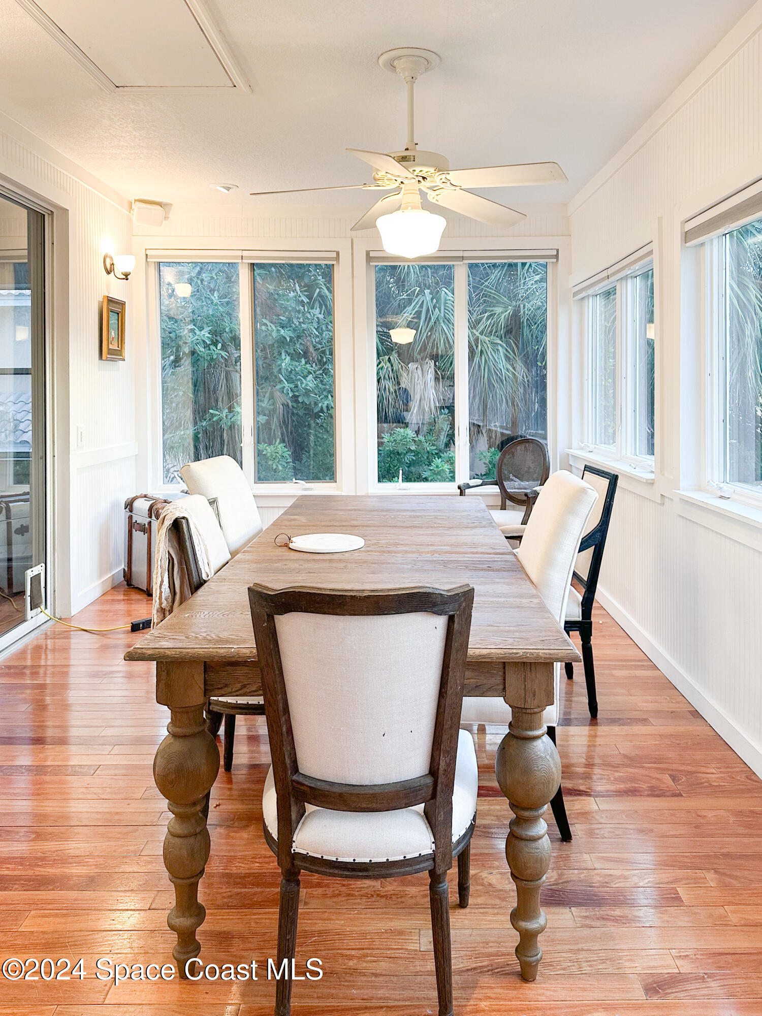 143 Caledonia Drive Melbourne Beach, FL 32951 - Photo 25 of 57 a view of a dining room with furniture window and outside view