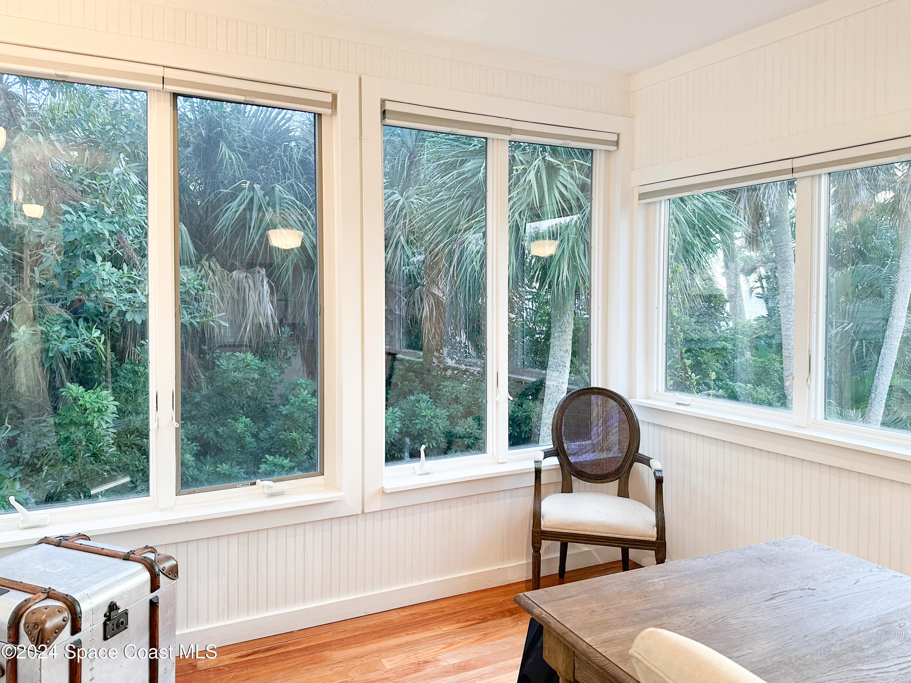 143 Caledonia Drive Melbourne Beach, FL 32951 - Photo 26 of 57 a room with a window and a bed