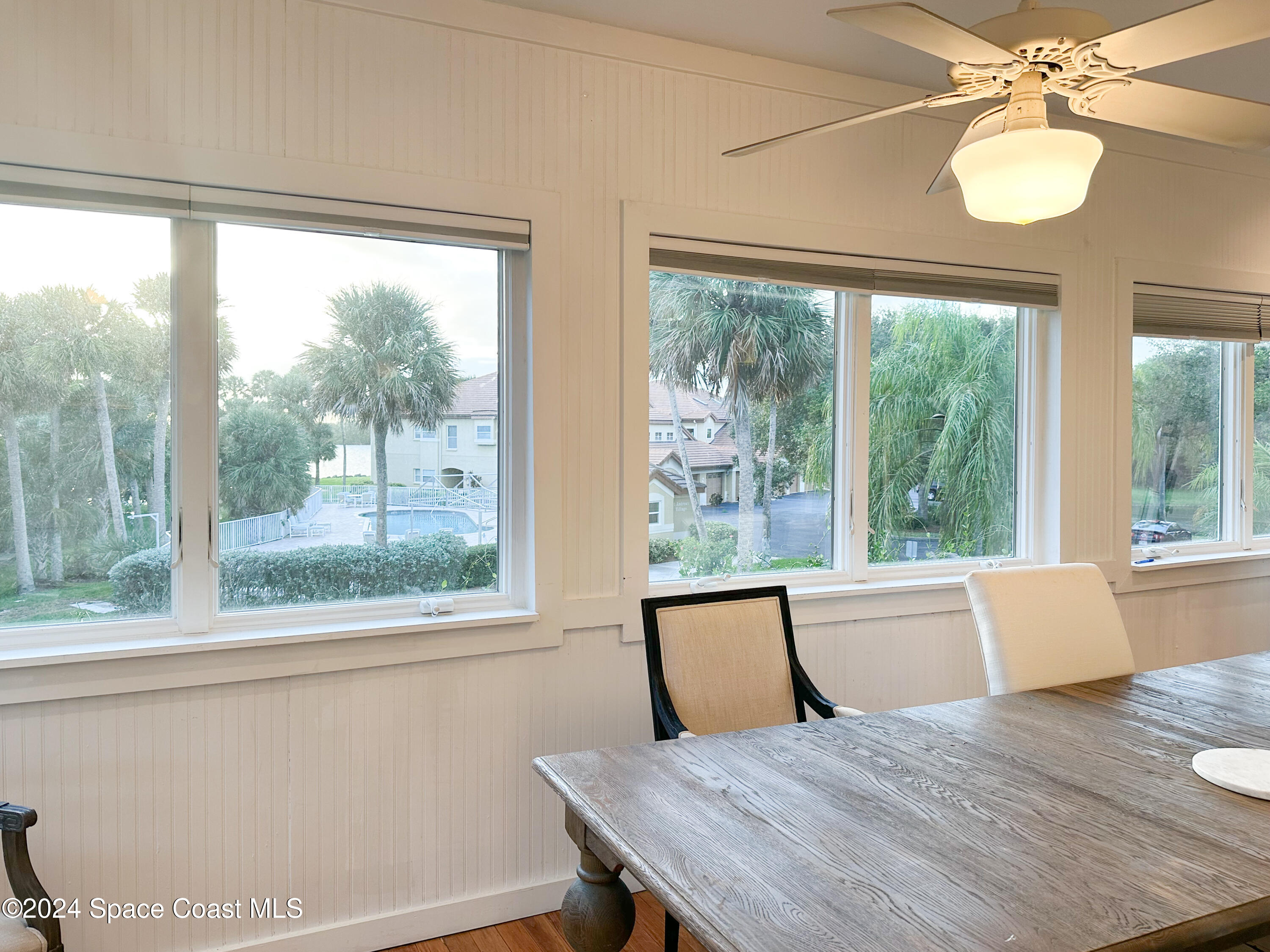 143 Caledonia Drive Melbourne Beach, FL 32951 - Photo 28 of 57 a view of a room with a table and chair