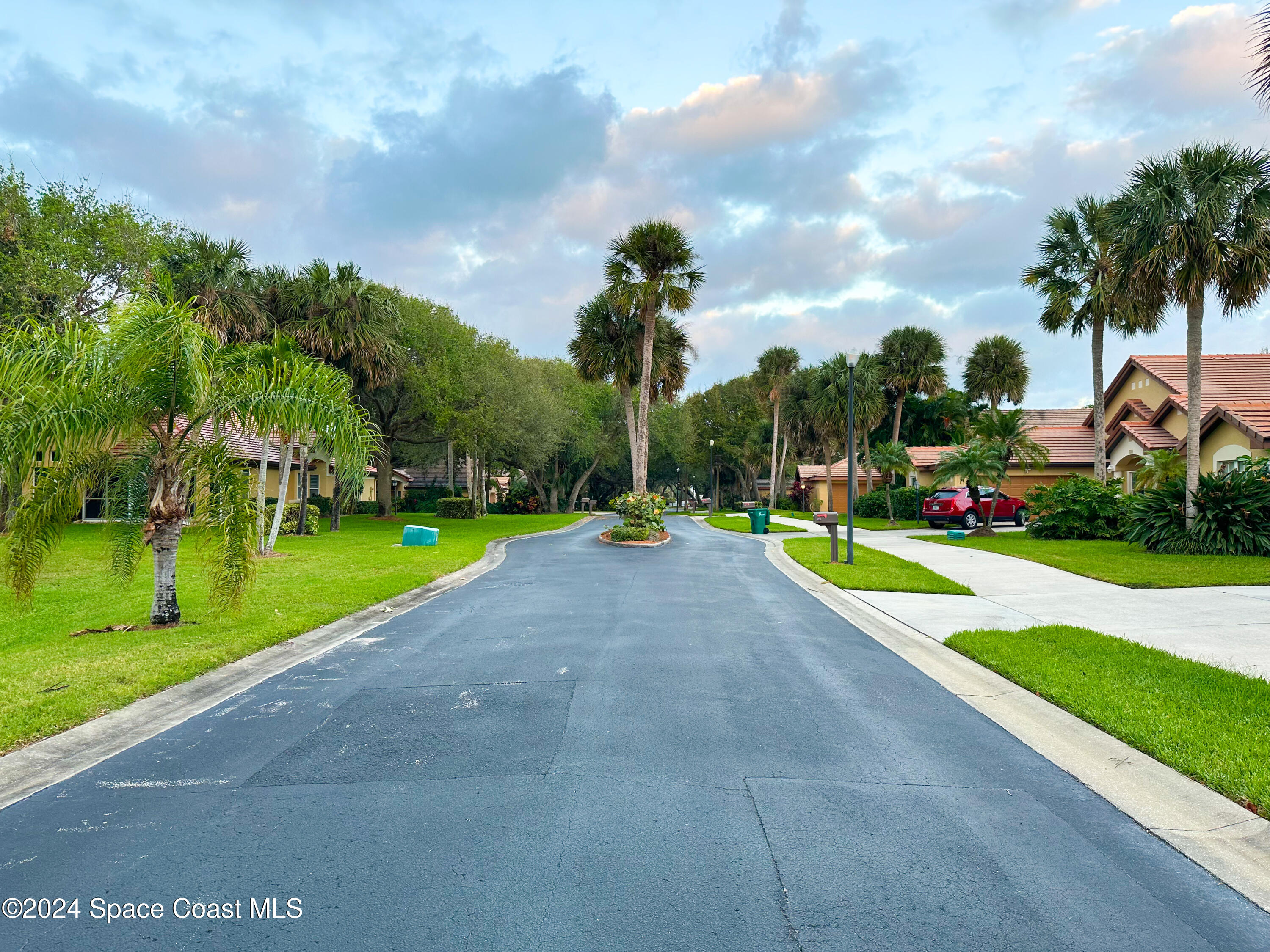 143 Caledonia Drive Melbourne Beach, FL 32951 - Photo 48 of 57 a view of a park with swings and slides