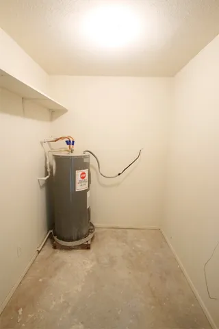 a view of storage and utility room with utility room