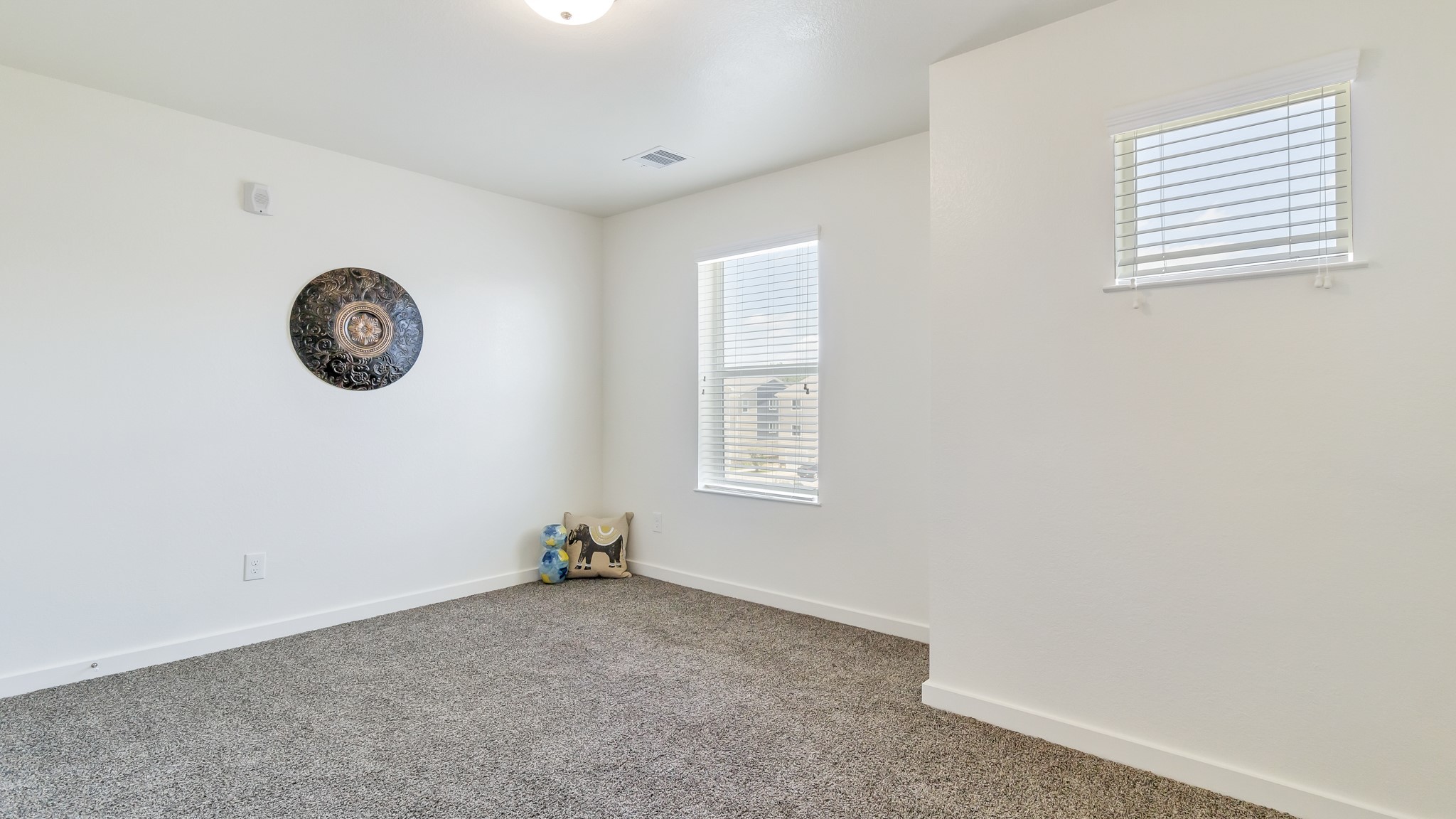 21155 Gosling Road, Unit 44C Spring, TX 77388 - Photo 16 of 31 a view of a room with a clock on the wall