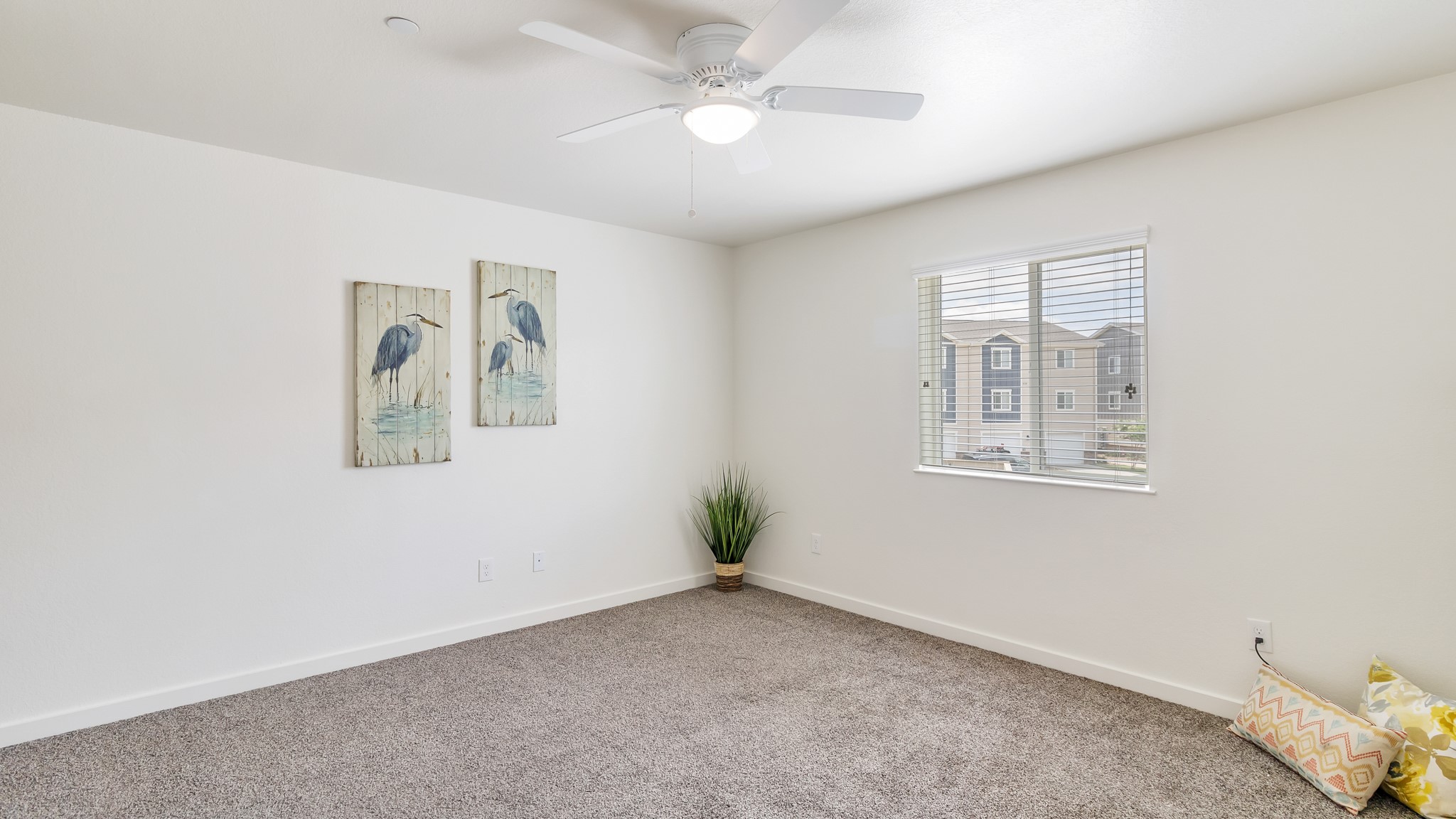 21155 Gosling Road, Unit 44C Spring, TX 77388 - Photo 5 of 31 an empty room with windows and closet