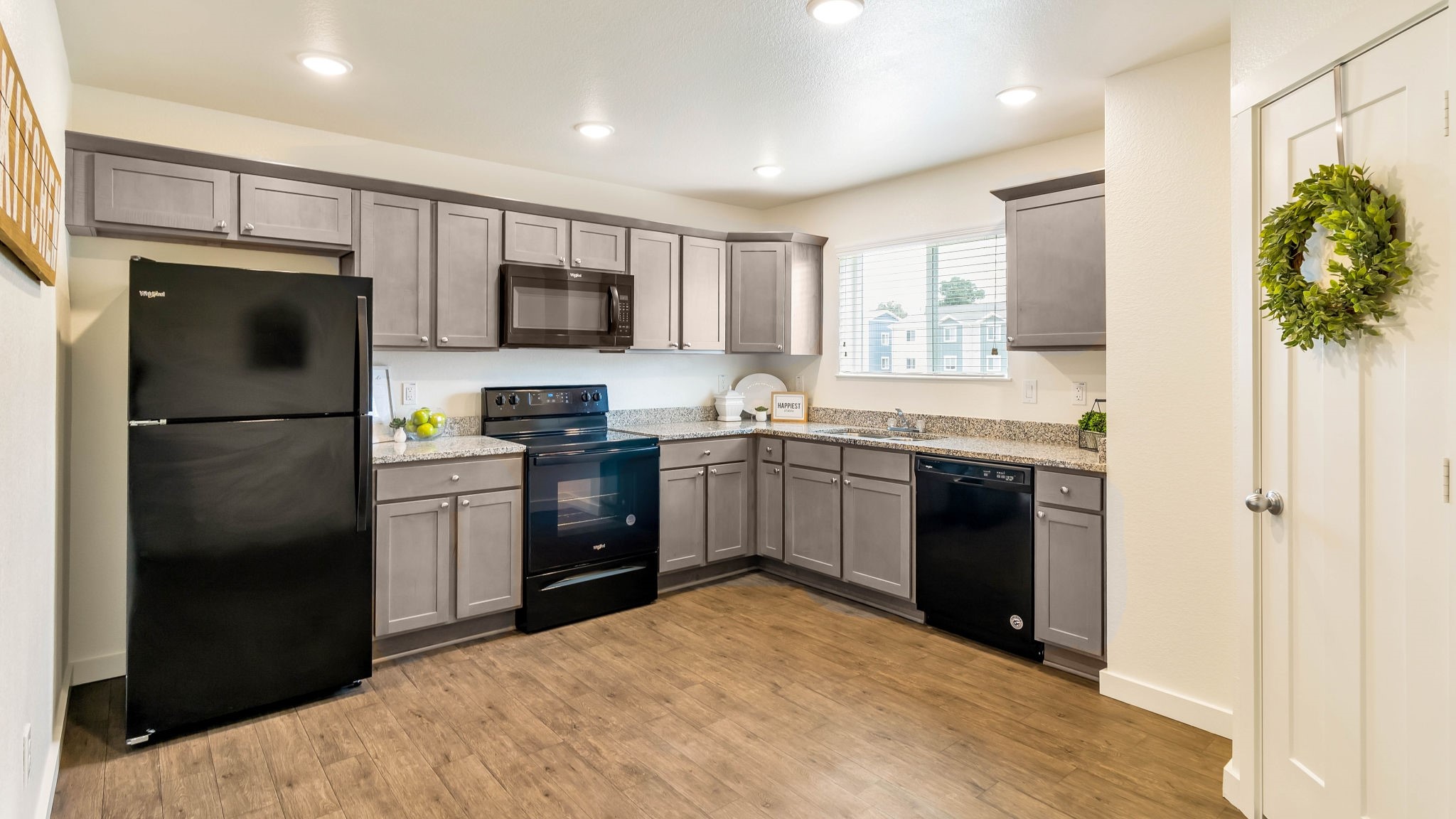 21155 Gosling Road, Unit 44C Spring, TX 77388 - Photo 8 of 31 a kitchen with a refrigerator and a sink