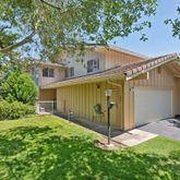 a view of a back yard of the house