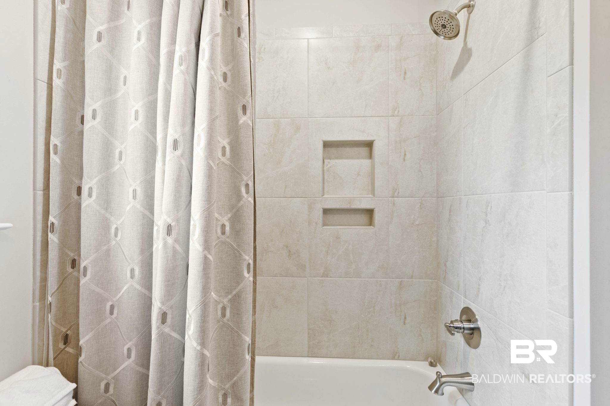 291 Hemlock Drive Fairhope, AL 36532 - Photo 40 of 65 Bathroom featuring shower / bathtub combination with curtain and toilet