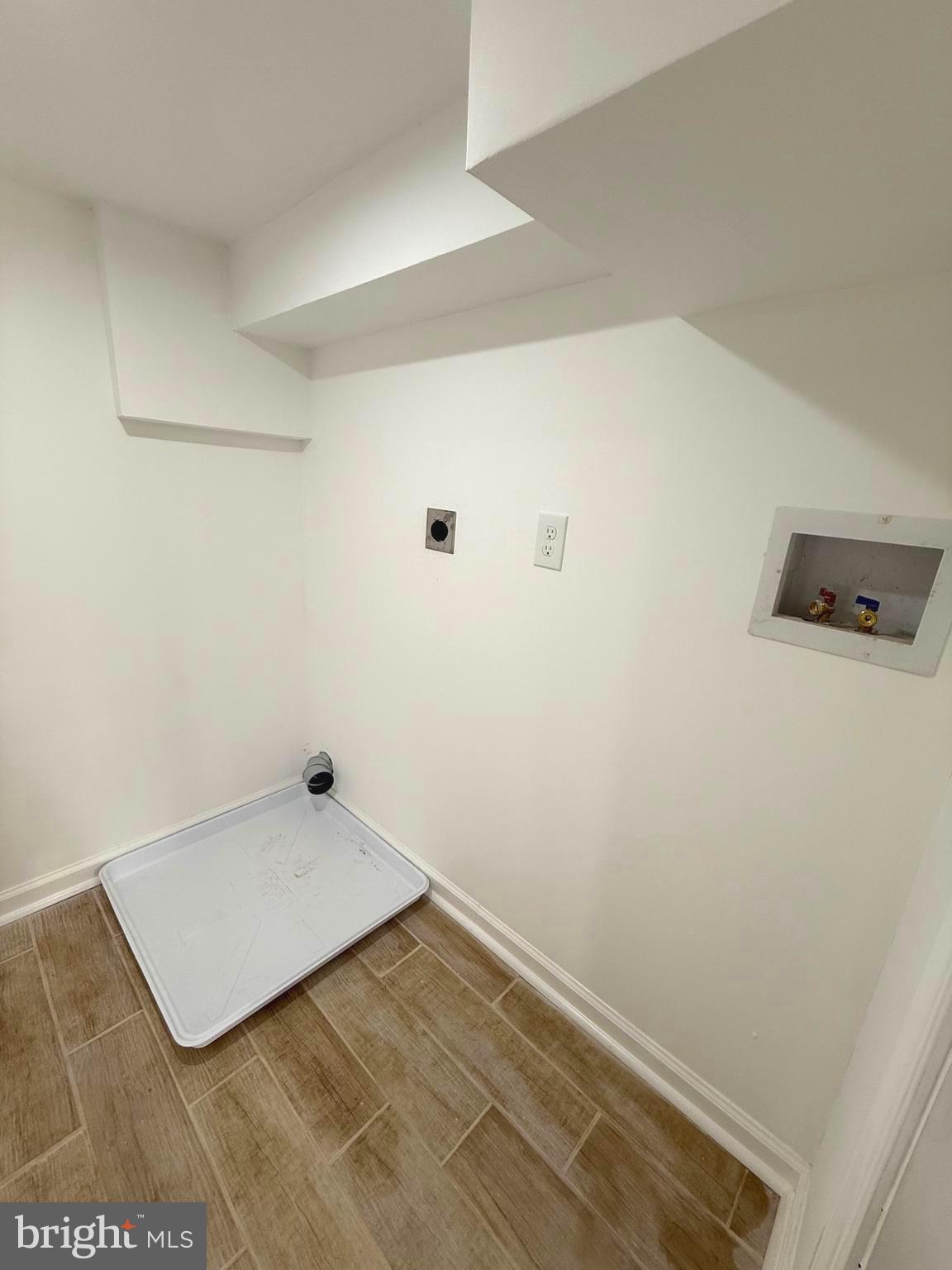 4803 Cordelia Avenue Baltimore, MD 21215 - Photo 34 of 39 a view of a room with an empty space