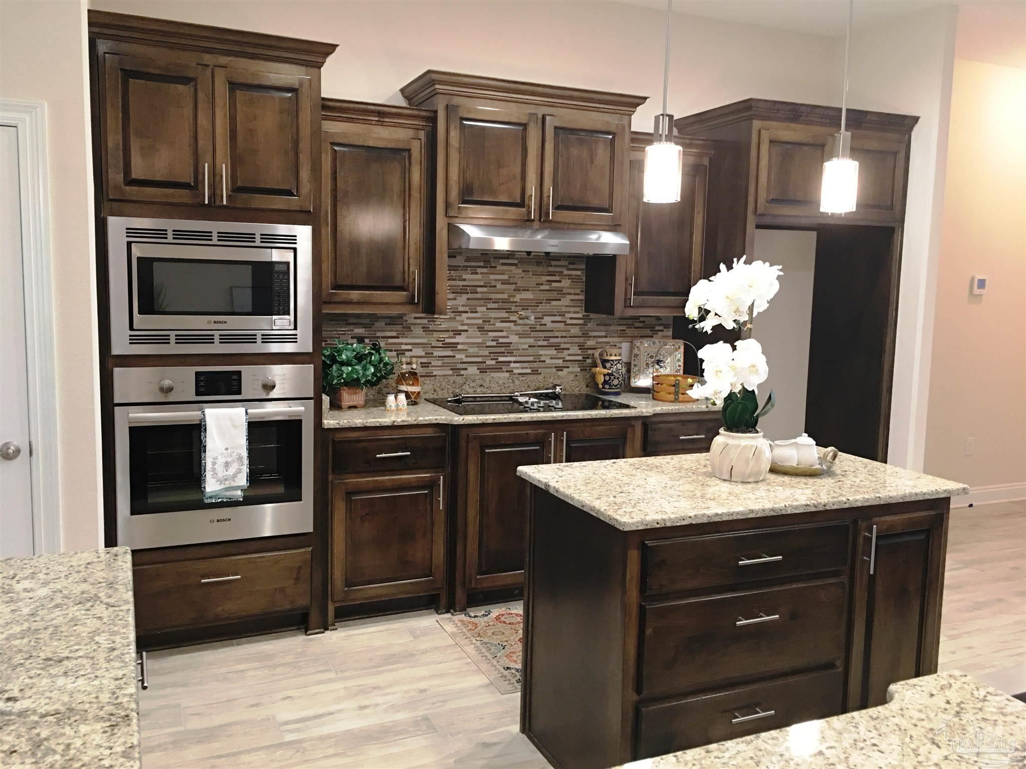 5210 South A Jones Road Milton, FL 32583 - Photo 11 of 37 Kitchen features separate oven & cooktop.