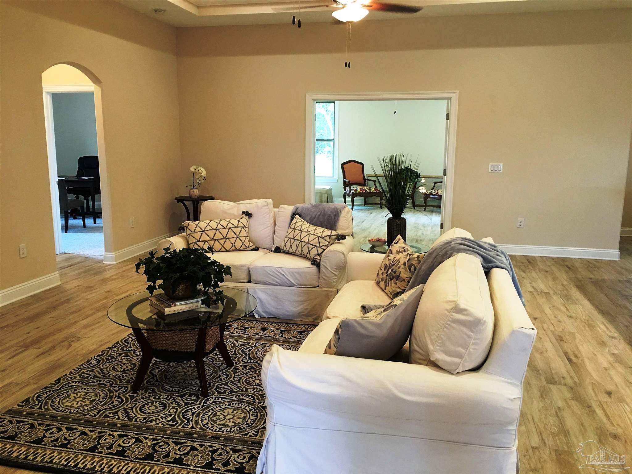5210 South A Jones Road Milton, FL 32583 - Photo 22 of 37 Living room has double box ceiling w/fan/light.