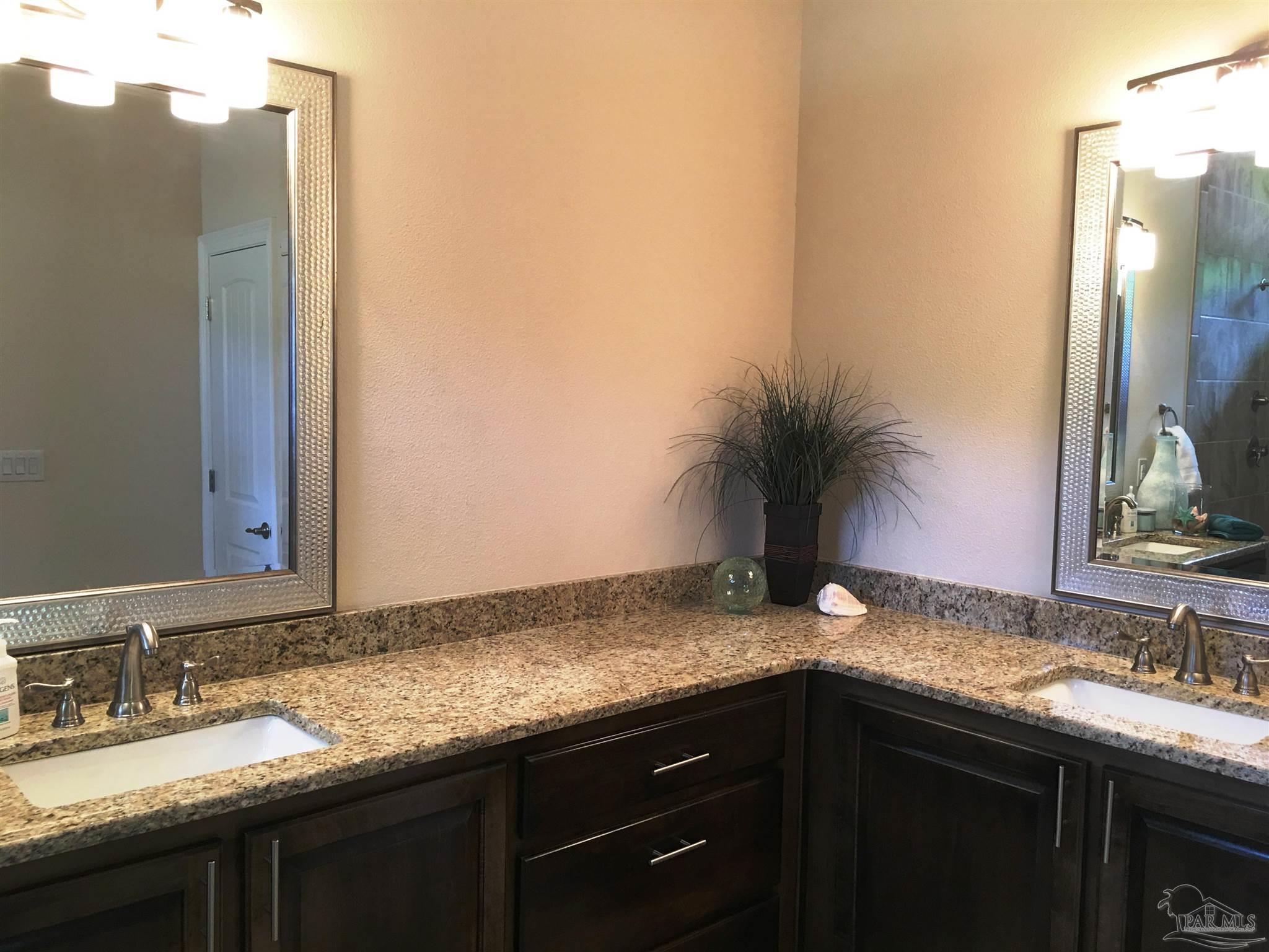 5210 South A Jones Road Milton, FL 32583 - Photo 28 of 37 Master bath features a dual sink vanity top.