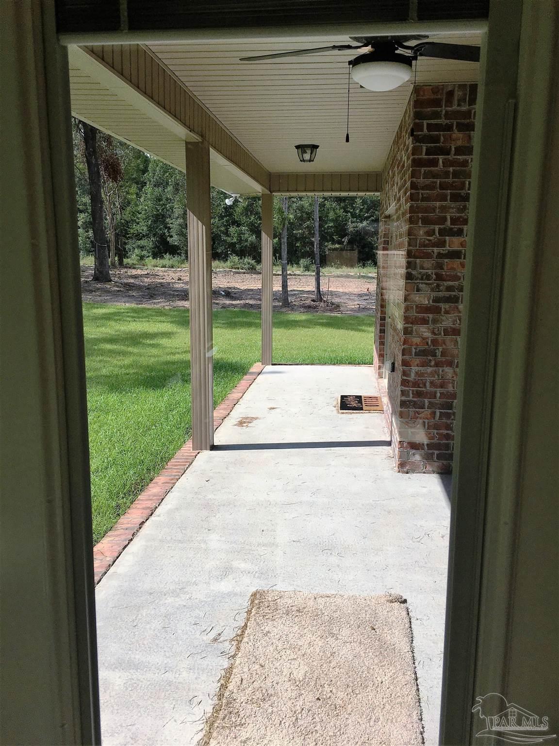 5210 South A Jones Road Milton, FL 32583 - Photo 33 of 37 Covered patio #1 is shown here.