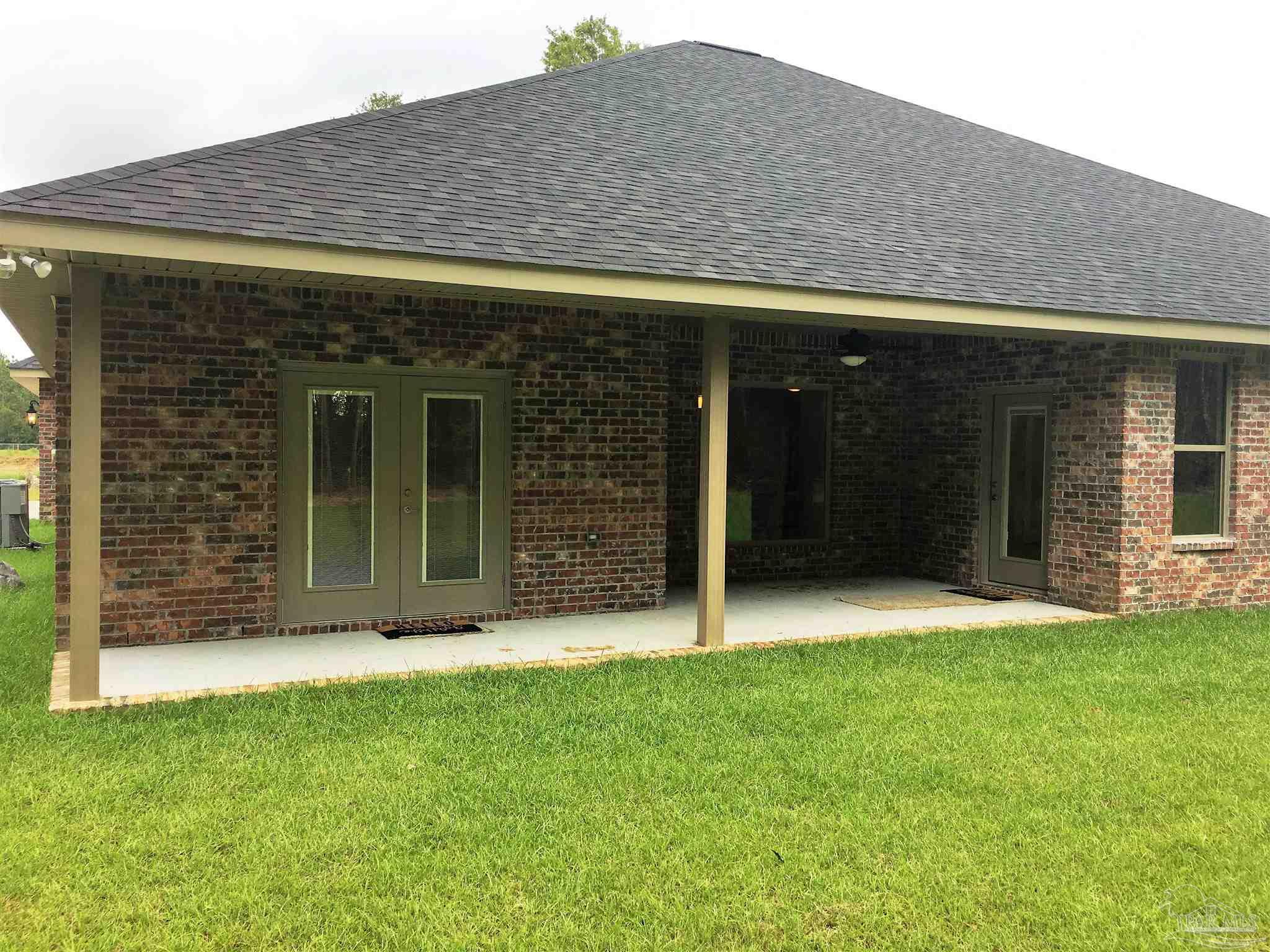 5210 South A Jones Road Milton, FL 32583 - Photo 34 of 37 An exterior view of patio #1 is seen here.