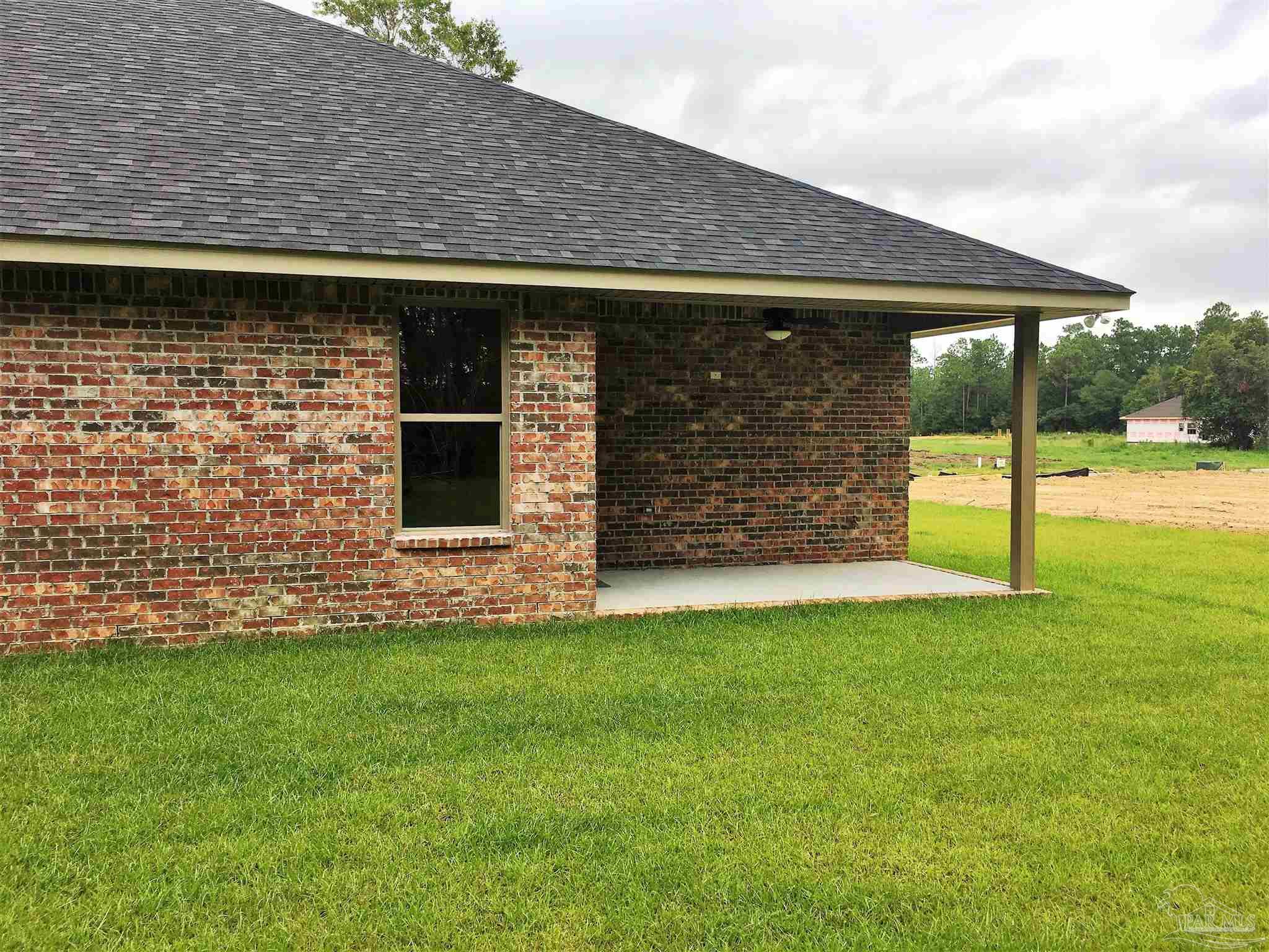 5210 South A Jones Road Milton, FL 32583 - Photo 36 of 37 An exterior view of patio #2 is seen here.