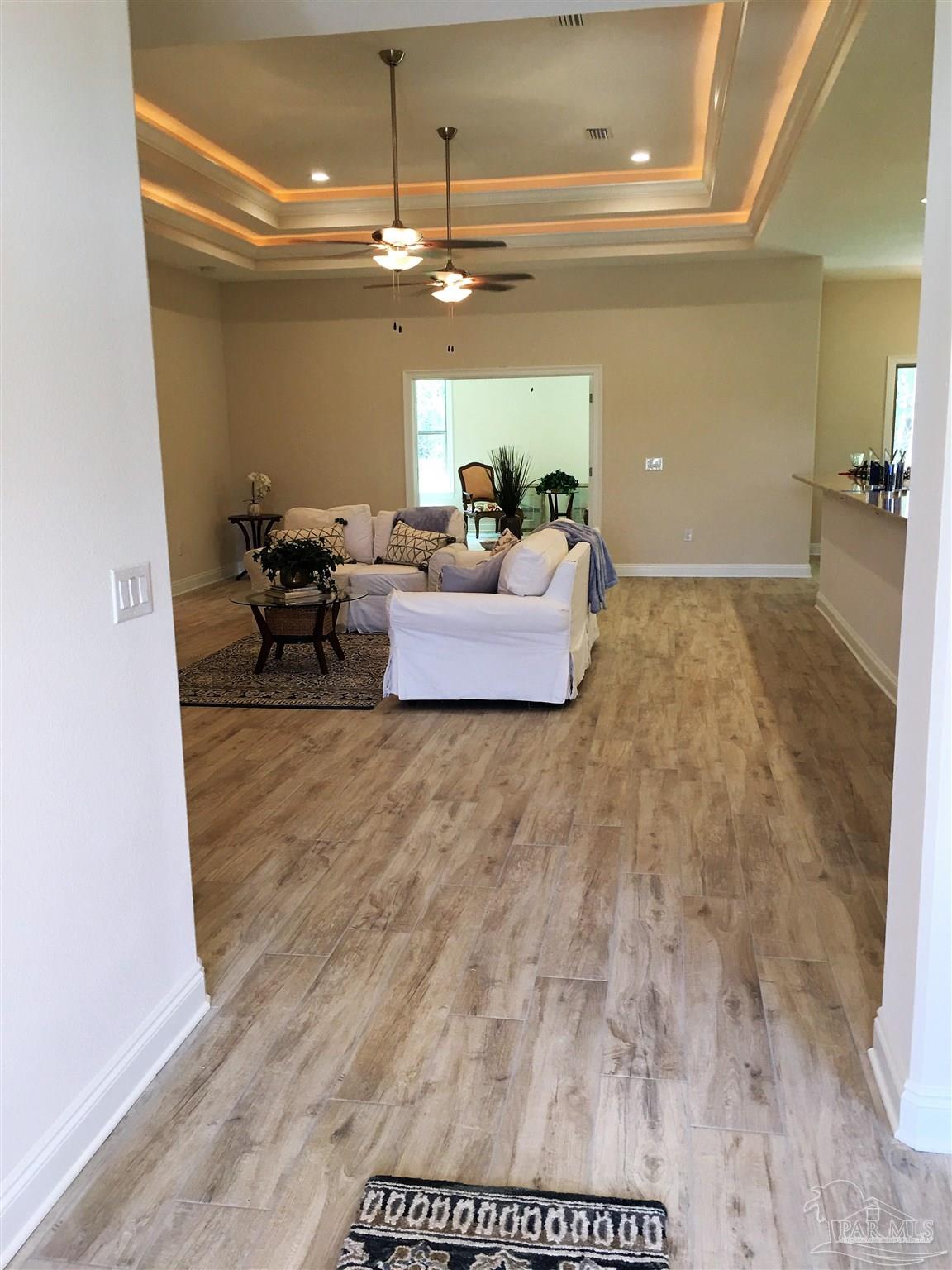 5210 South A Jones Road Milton, FL 32583 - Photo 4 of 37 A view from foyer to living room is shown here.