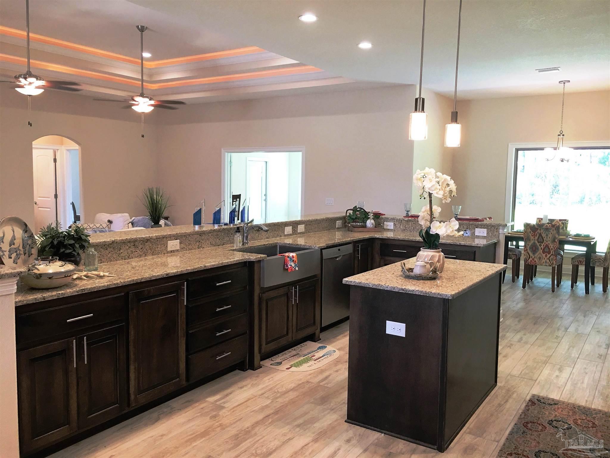 5210 South A Jones Road Milton, FL 32583 - Photo 5 of 37 A view from kitchen to nook is seen here.