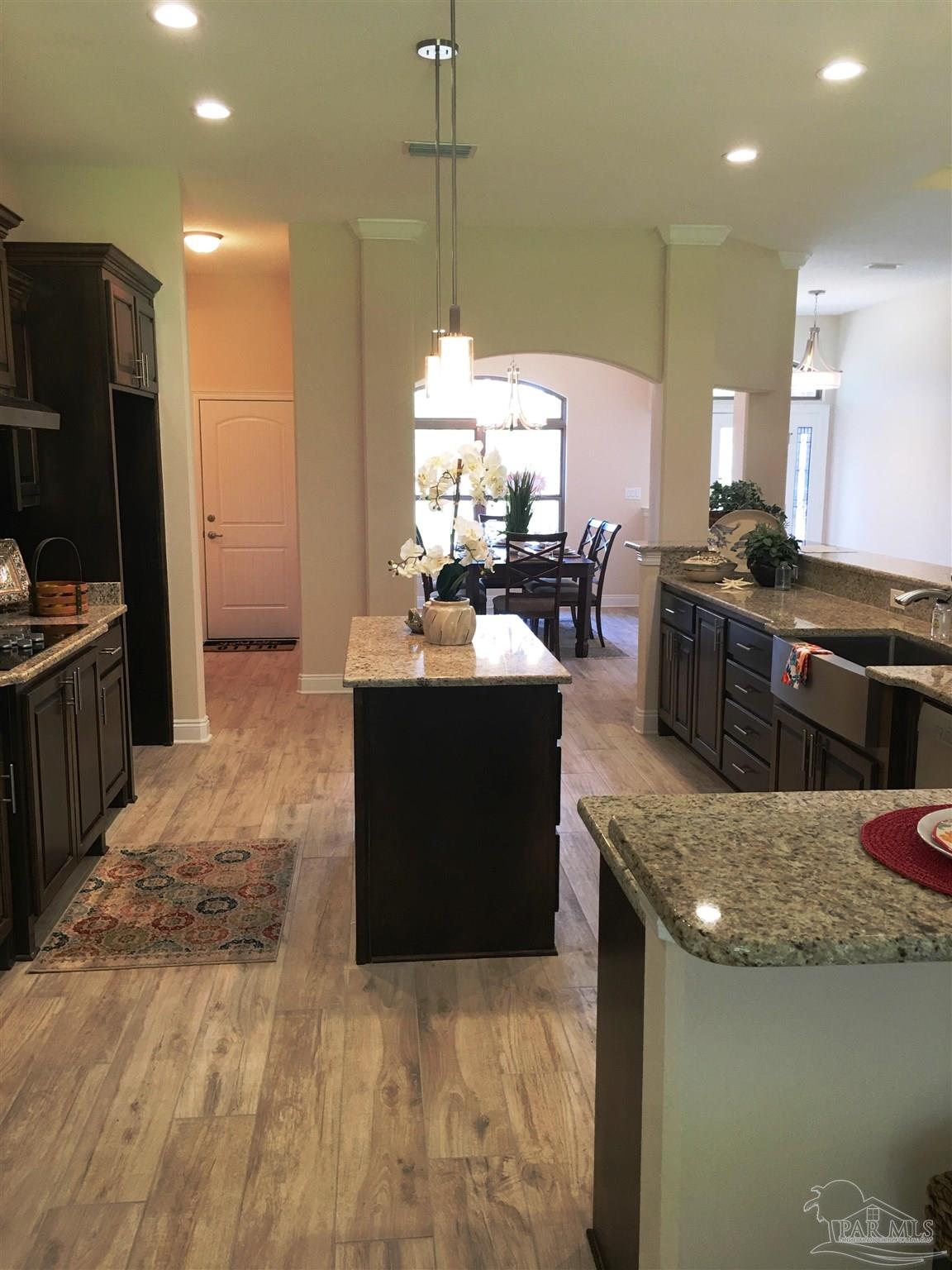 5210 South A Jones Road Milton, FL 32583 - Photo 7 of 37 Here's a view from kitchen to dining room.