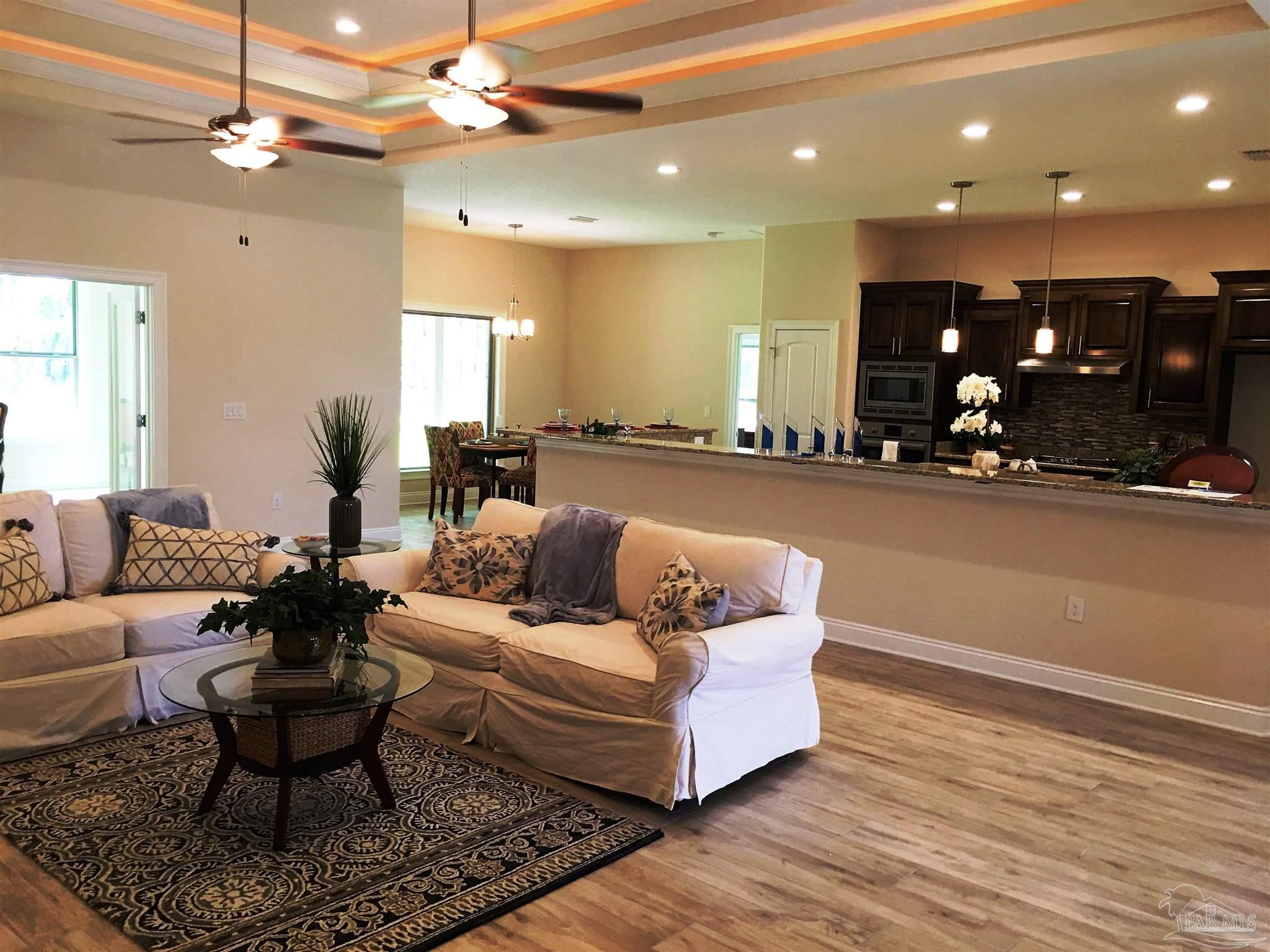 5210 South A Jones Road Milton, FL 32583 - Photo 10 of 37 Bar easily seats 10 to 12 adults.