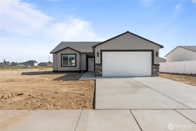 a front view of a house with yard