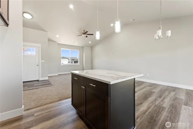 an empty room with wooden floor