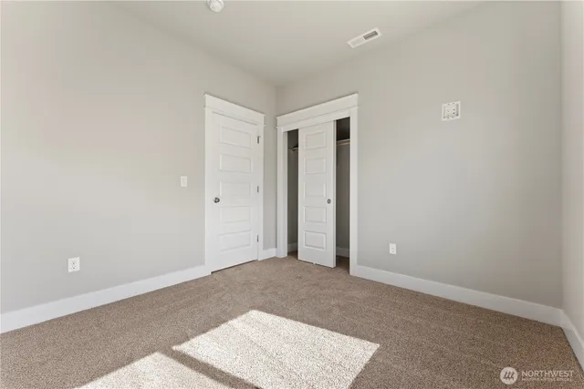 an empty room with an entryway