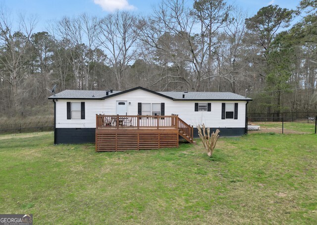 a front view of a house with a garden and trees
