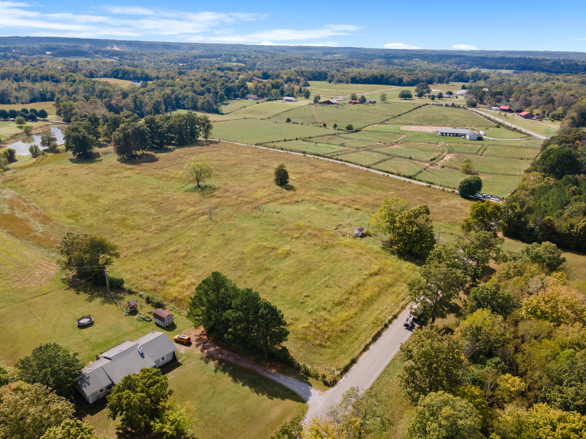 7303 Doug Hill Road Bon Aqua, TN 37025 - Photo 2 of 8 a view of an ocean and beach