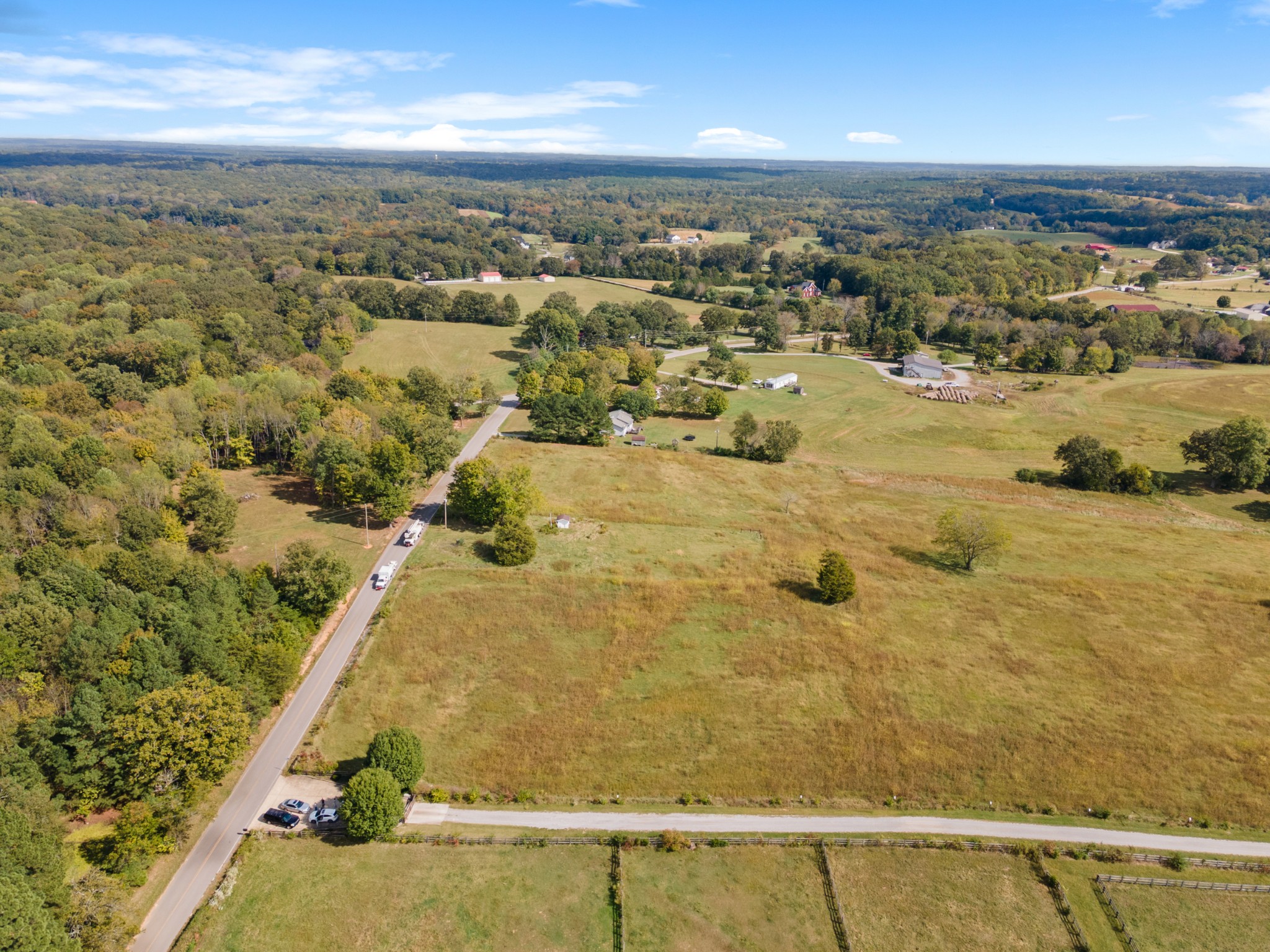 7303 Doug Hill Road Bon Aqua, TN 37025 - Photo 6 of 8 an aerial view of residential houses with outdoor space