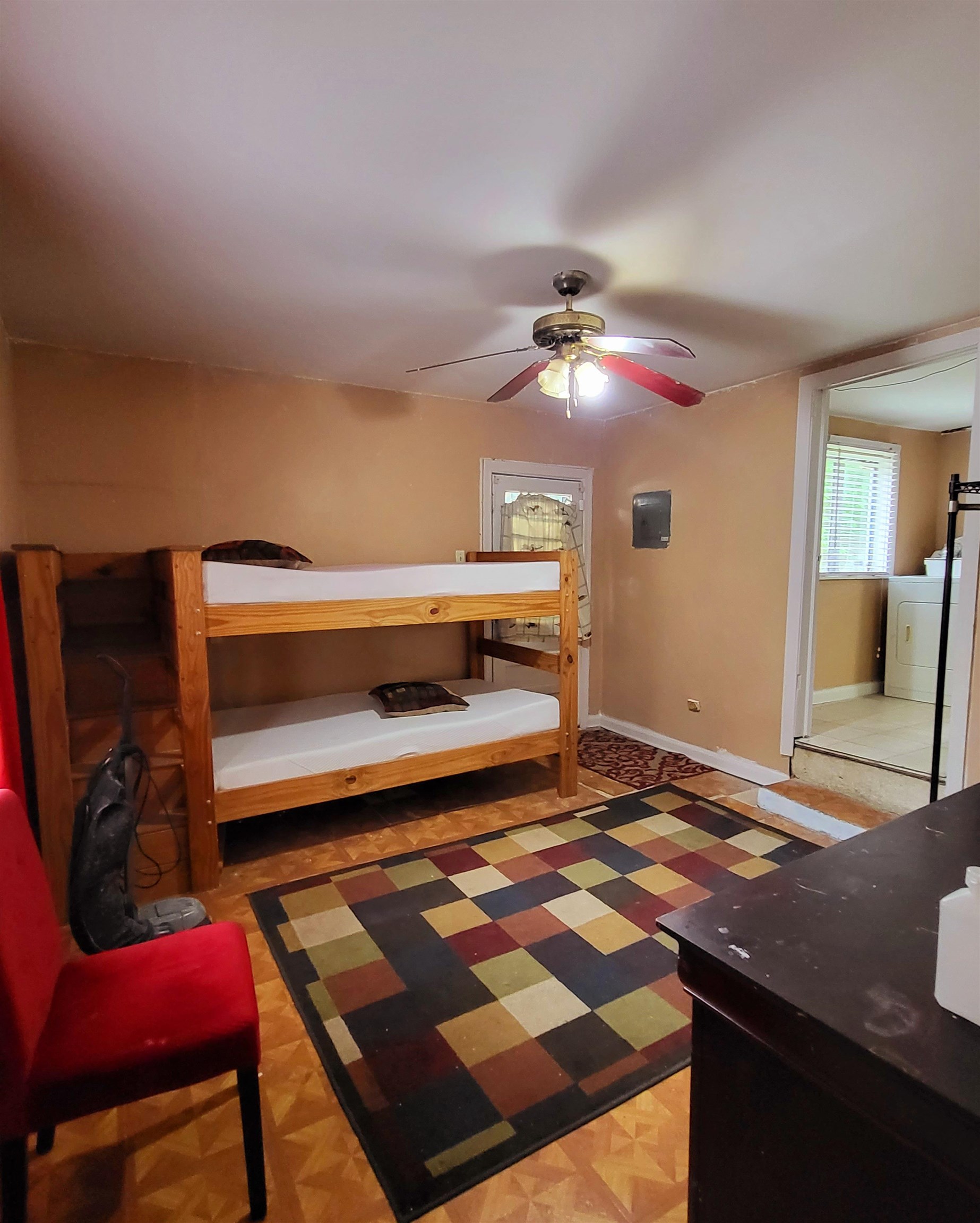 3480 Old Getwell Road Memphis, TN 38118 - Photo 13 of 20 a bedroom with a bed and a chandelier
