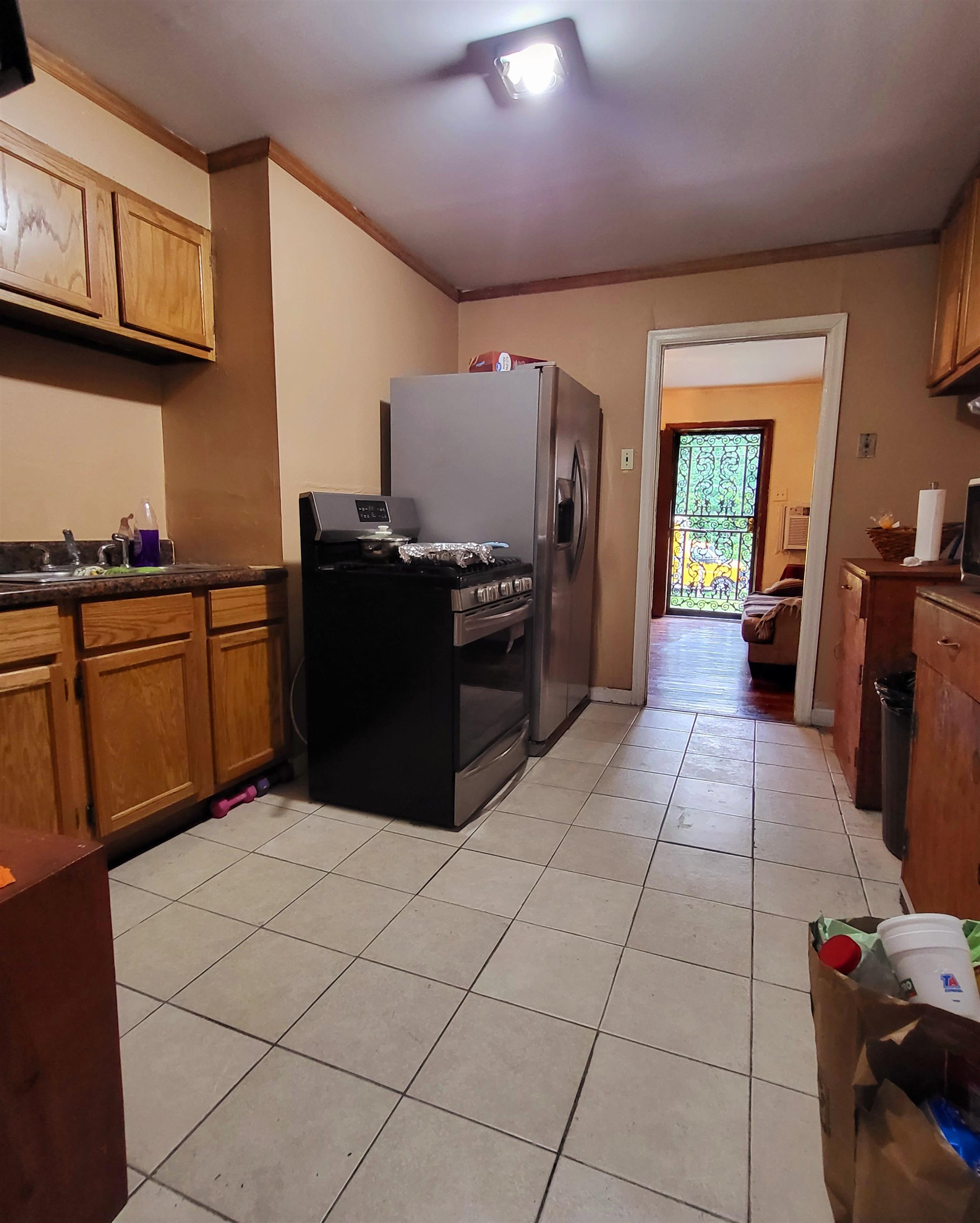 3480 Old Getwell Road Memphis, TN 38118 - Photo 15 of 20 a kitchen with stainless steel appliances granite countertop a refrigerator and a stove top oven