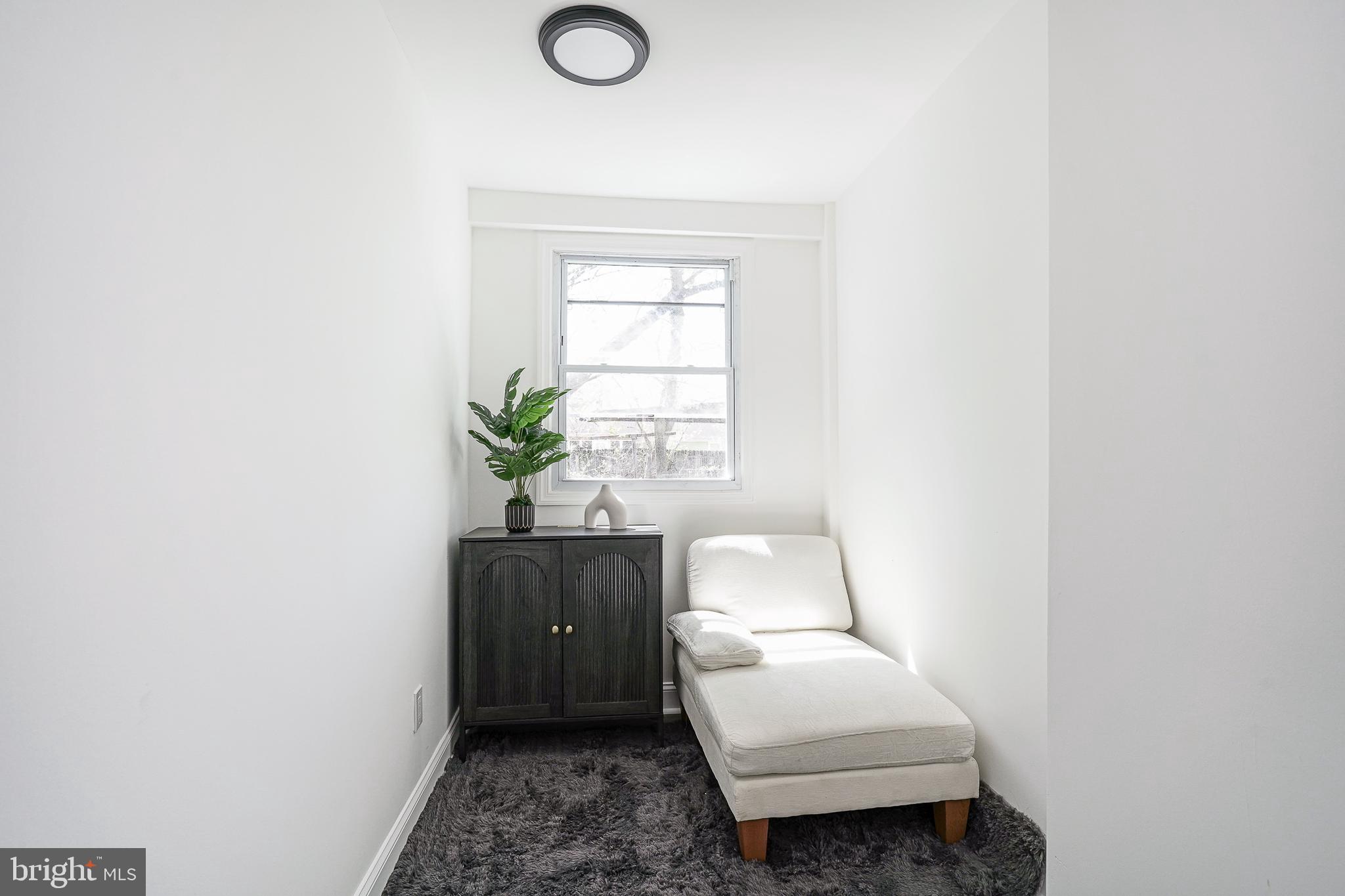 133 Lemmon Avenue Pemberton, NJ 08068 - Photo 11 of 25 a room with a couch and potted plant