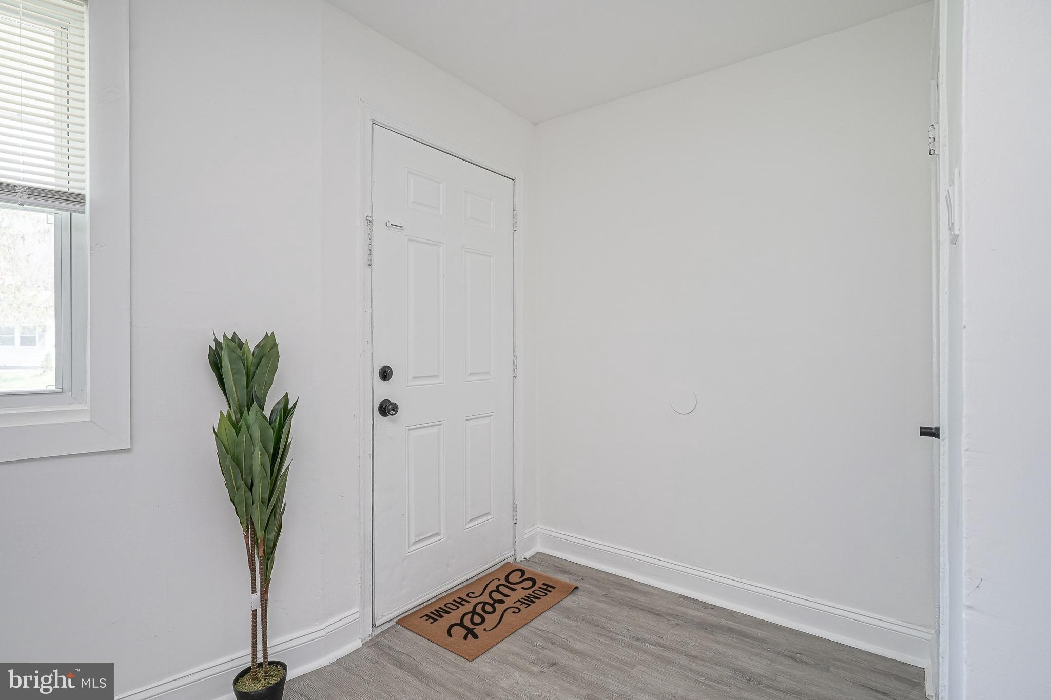 133 Lemmon Avenue Pemberton, NJ 08068 - Photo 2 of 25 a view of entryway with wooden floor