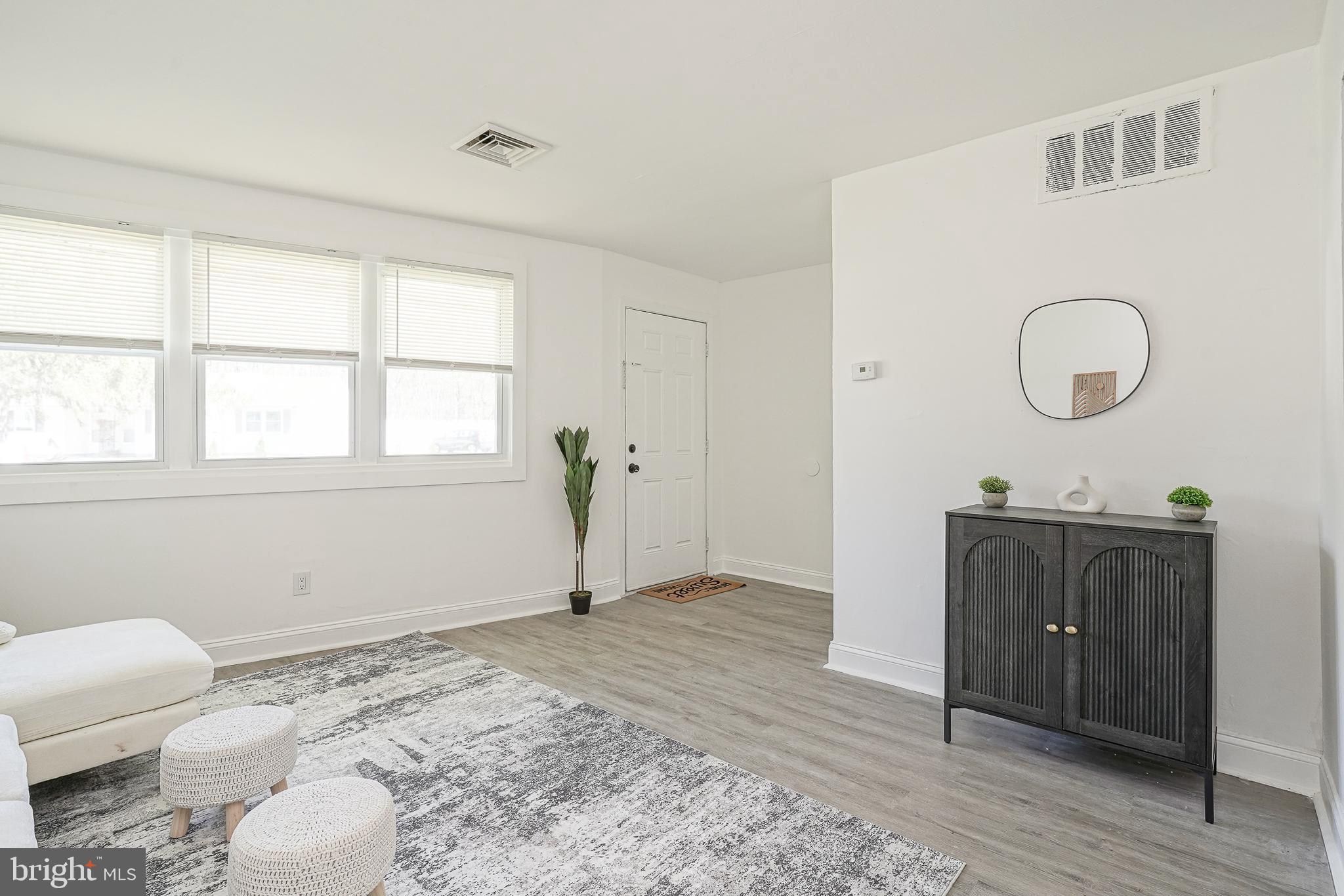 133 Lemmon Avenue Pemberton, NJ 08068 - Photo 5 of 25 a view of a livingroom with wooden floor and furniture