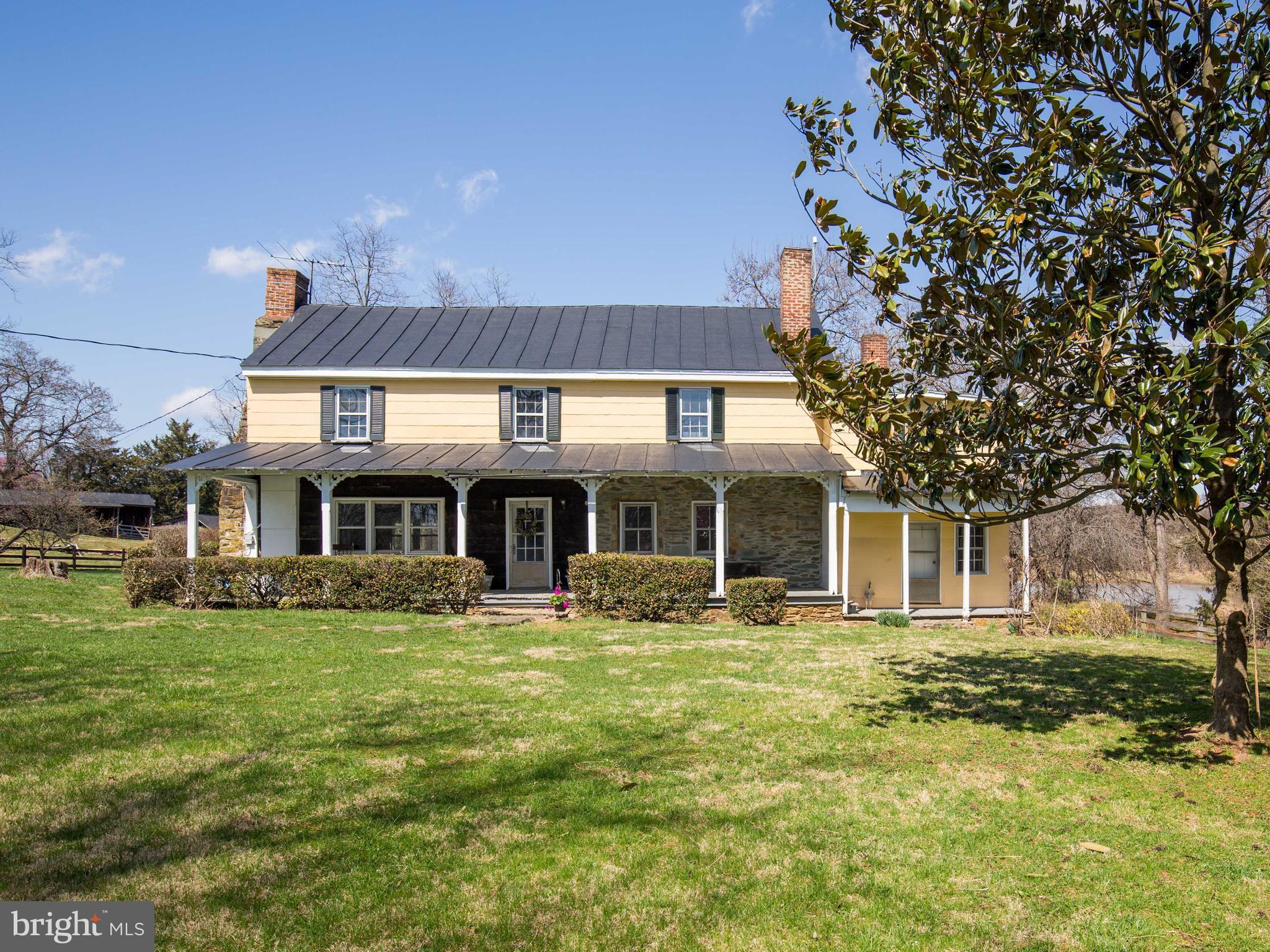 18812 Harmony Church Road Leesburg, VA 20175 - Photo 2 of 30 a front view of a house with a garden