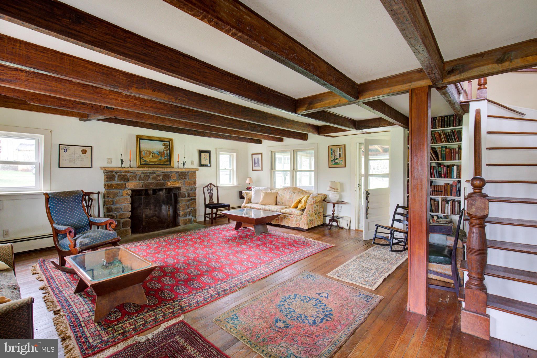 18812 Harmony Church Road Leesburg, VA 20175 - Photo 13 of 30 a living room with furniture a fireplace and next to a window