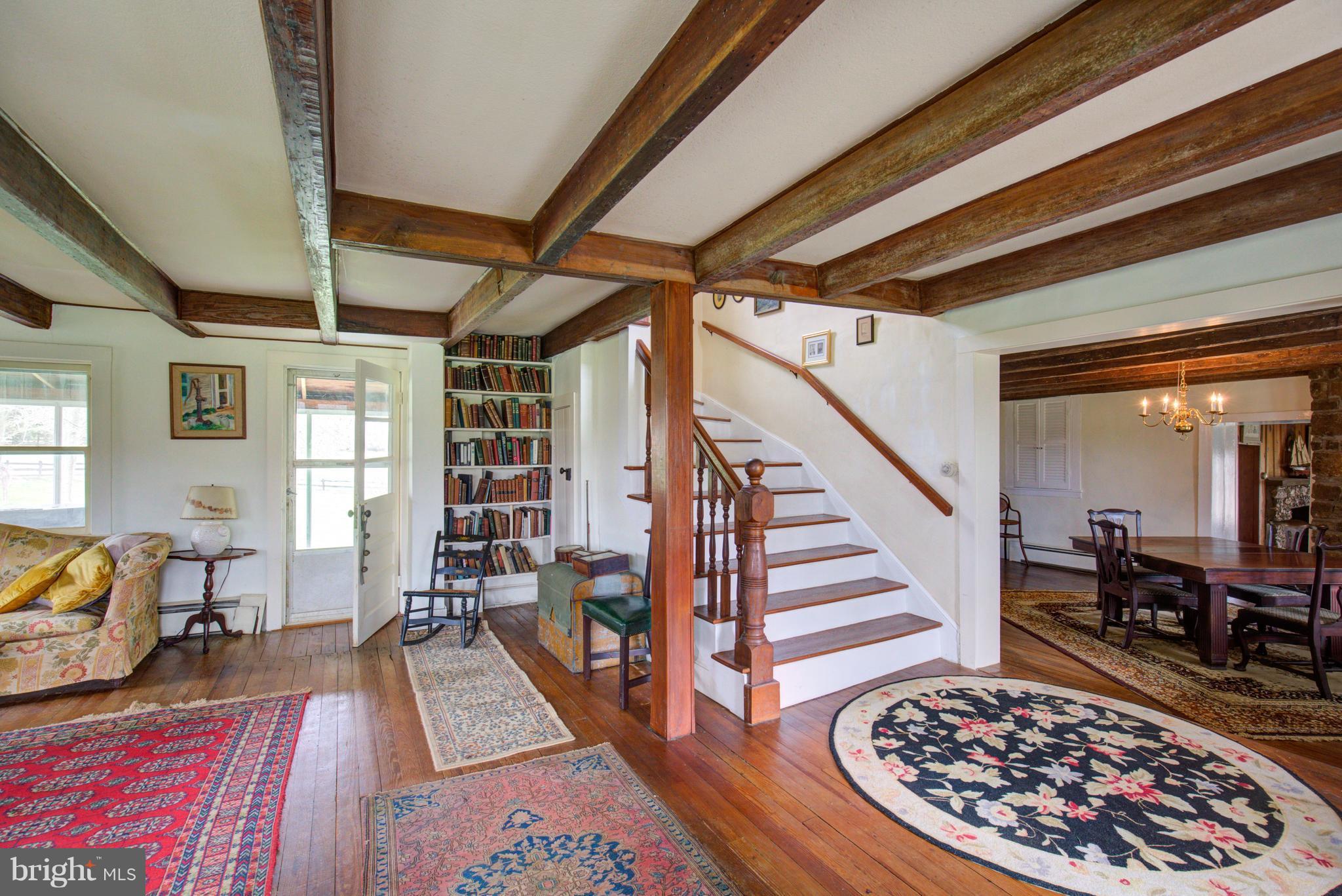 18812 Harmony Church Road Leesburg, VA 20175 - Photo 14 of 30 a view of entryway livingroom and hall with wooden floor