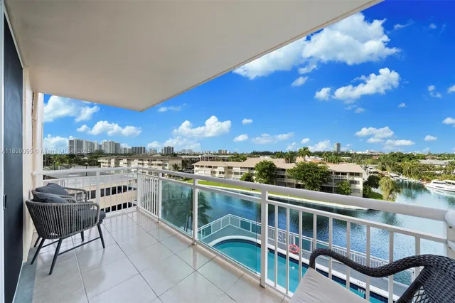 a view of a balcony with a patio