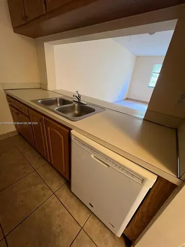 a utility room with washer and dryer