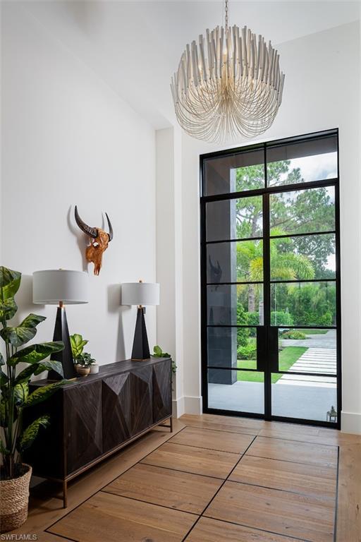 728 Carica Road Naples, FL 34108 - Photo 3 of 26 a view of entryway with livingroom