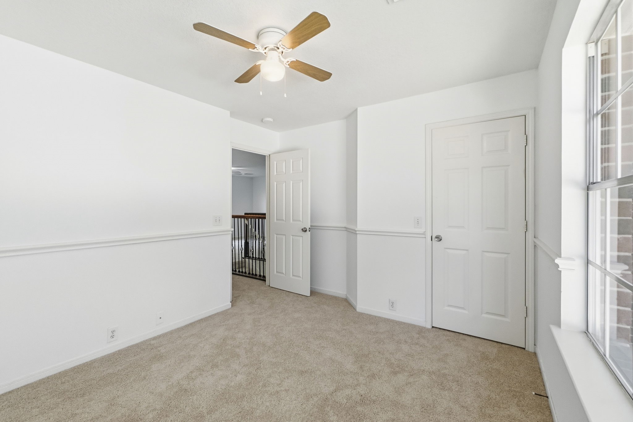 11907 Ezekiel Road Tomball, TX 77375 - Photo 35 of 39 a view of a livingroom with a ceiling fan