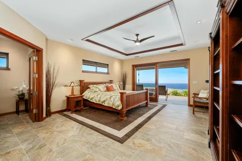 a bed room with a bed and a couch