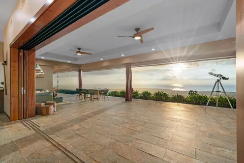 a view of a terrace with sitting area