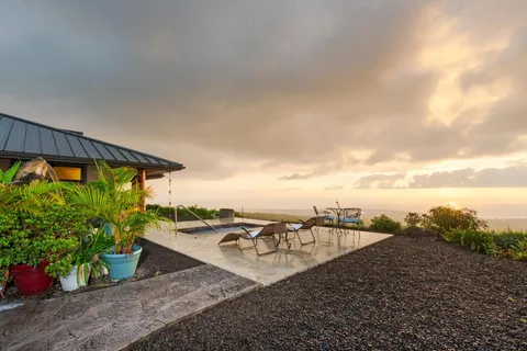 a view of a terrace with furniture