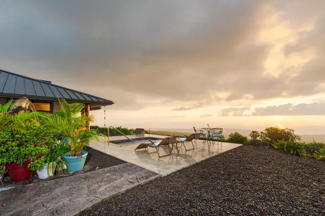 a view of a terrace with furniture