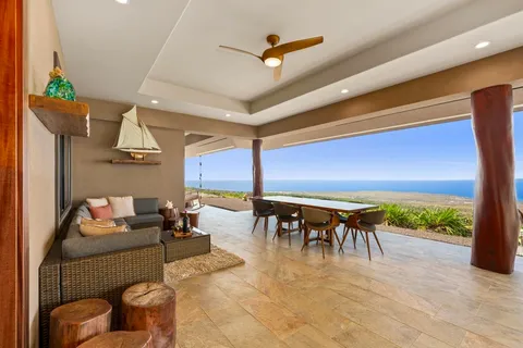 a kitchen with stainless steel appliances granite countertop a refrigerator and a stove