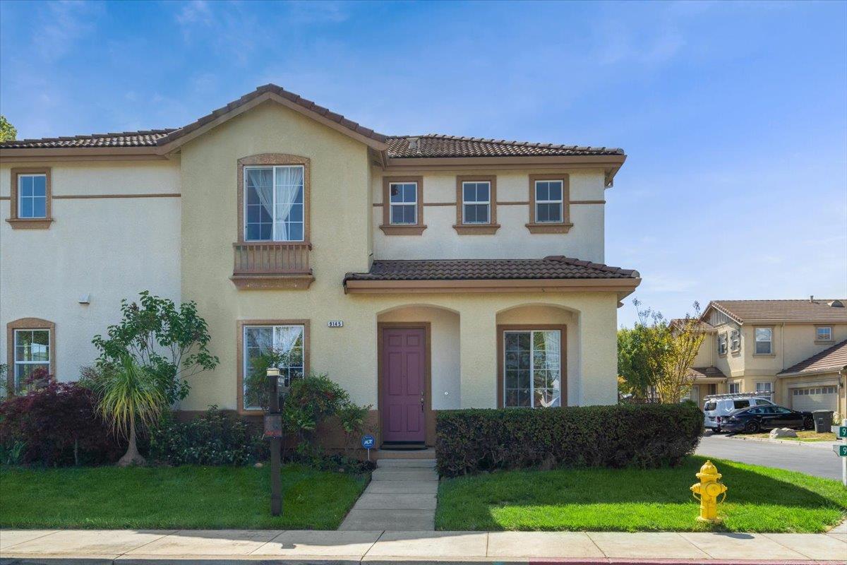 9145 Desiderio Way Gilroy, CA 95020 - Photo 2 of 33 a front view of a house with a yard