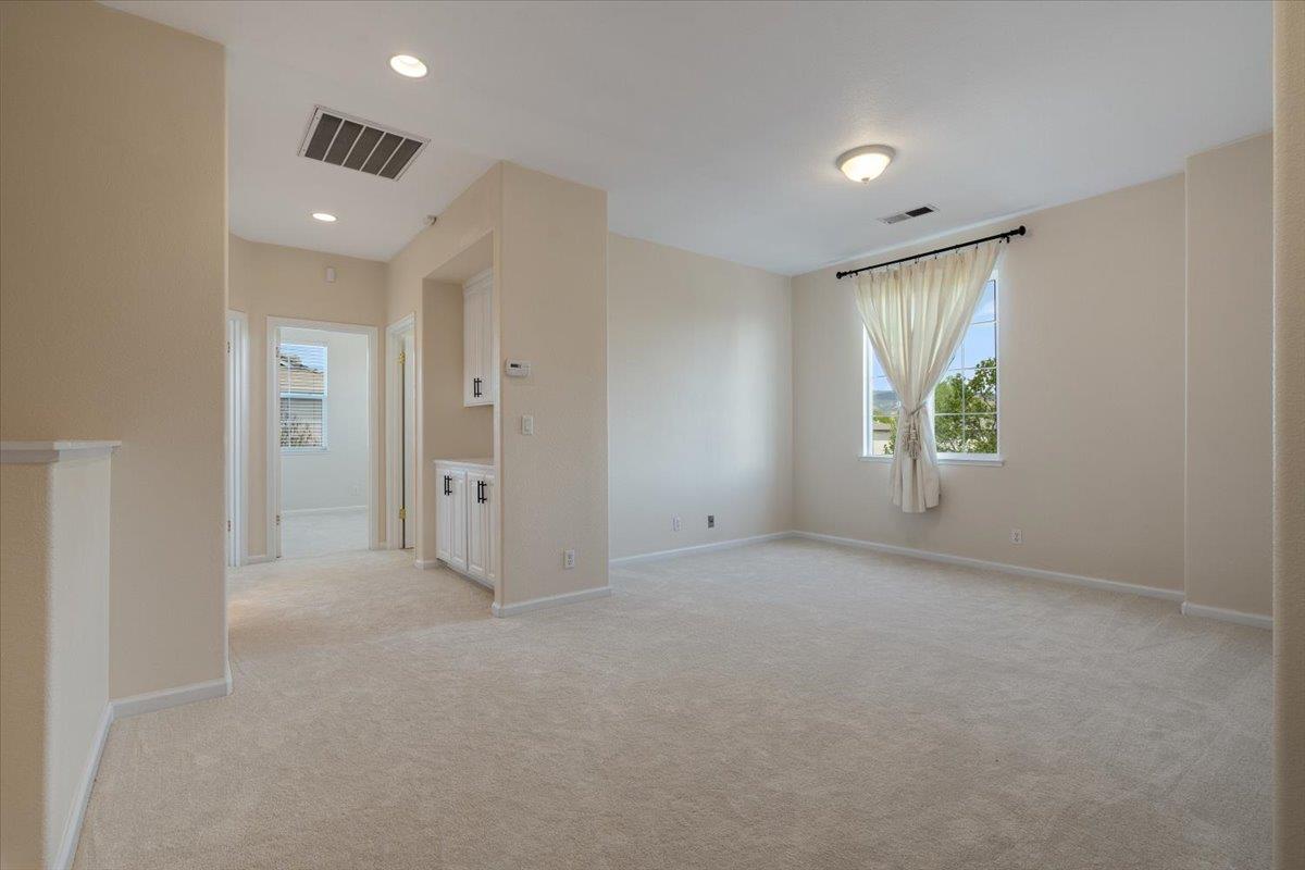 9145 Desiderio Way Gilroy, CA 95020 - Photo 21 of 33 a view of an empty room with a window