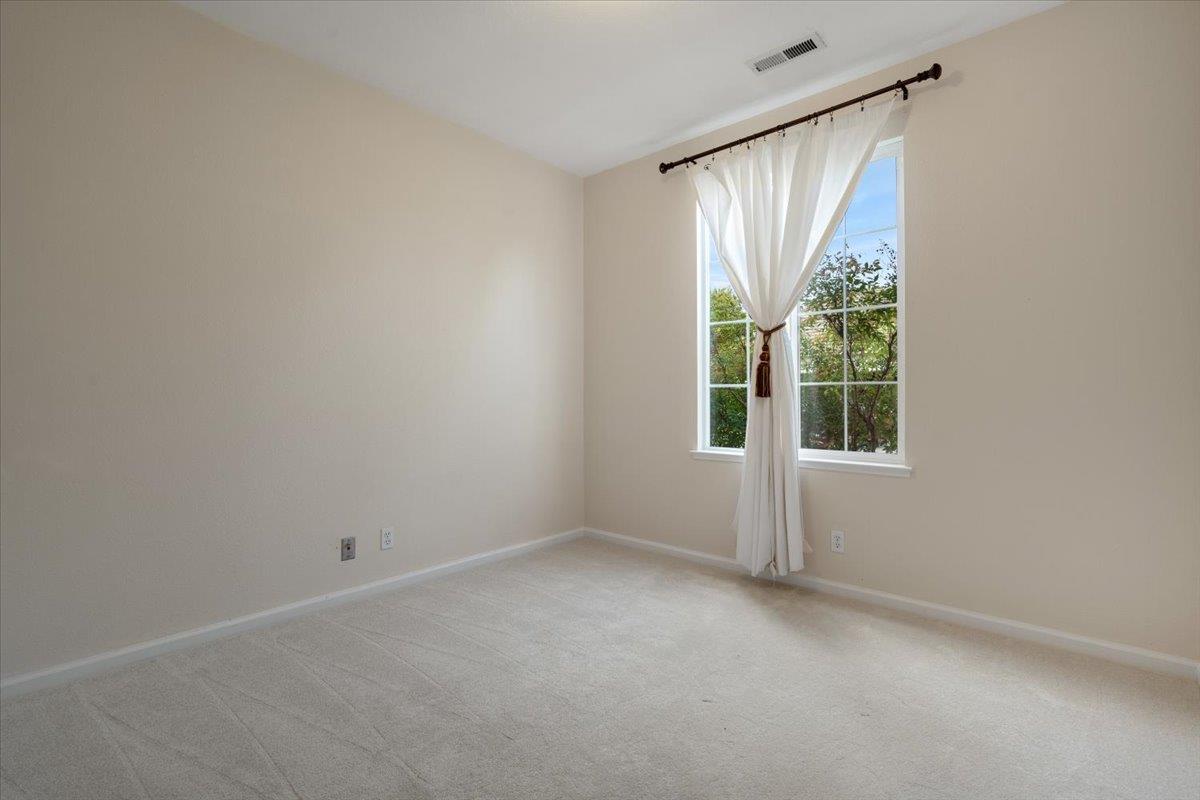 9145 Desiderio Way Gilroy, CA 95020 - Photo 23 of 33 an empty room with a window