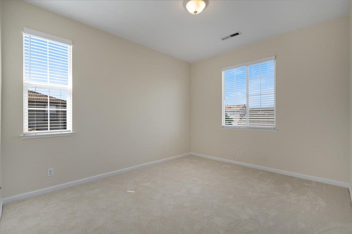 9145 Desiderio Way Gilroy, CA 95020 - Photo 24 of 33 a view of an empty room with a window