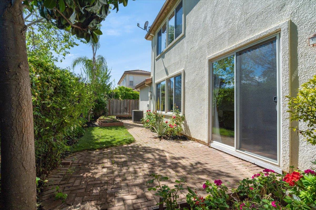 9145 Desiderio Way Gilroy, CA 95020 - Photo 26 of 33 a view of a house with backyard and garden