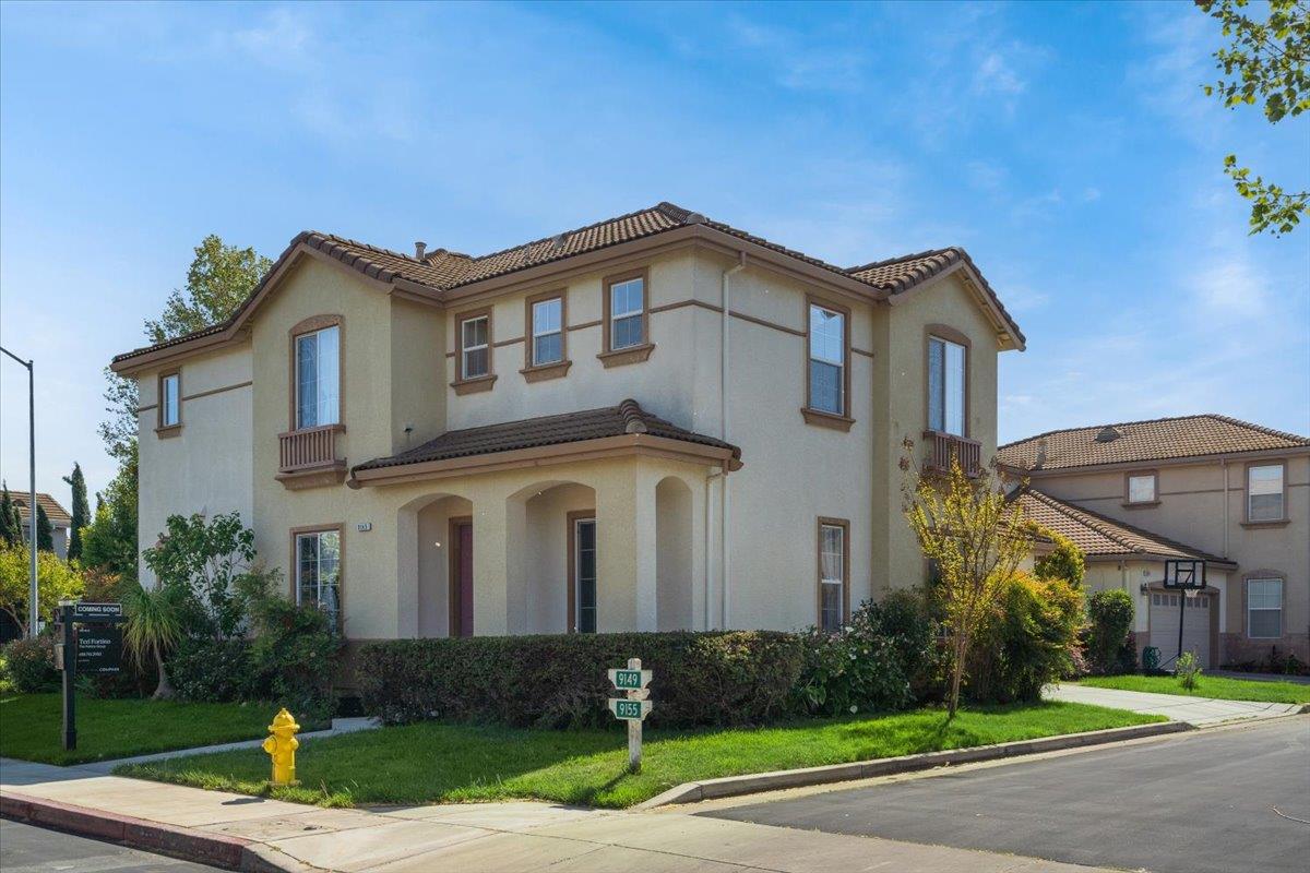 9145 Desiderio Way Gilroy, CA 95020 - Photo 3 of 33 a front view of a house with a yard